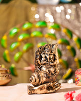 Antique Gold Ganesha on Palm