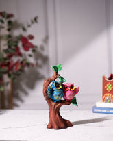 Colorful Owl Couple on Tree