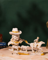 Cowboy Rider and Cattle Sculpture