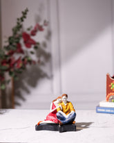Romantic Couple Sitting Together Statue