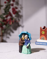 Romantic Old Couple Under Umbrella Figurine