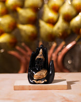 Buddha Head on Hand Sculpture