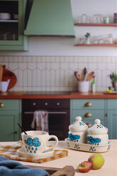 Alamkari India Ceramic Tip Tip Rain Cup & Saucer Set