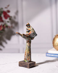 Hand Holding Face Sculpture - Multicolour