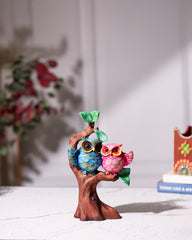 Colorful Owl Couple on Tree