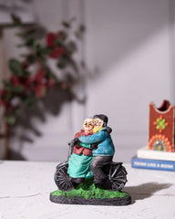 Elderly Couple on Bicycle Statue
