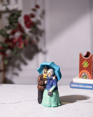 Romantic Old Couple Under Umbrella Figurine