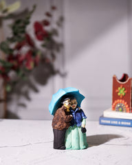 Romantic Old Couple Under Umbrella Figurine