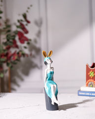 Seated Girl Figurine with Bunny Ears