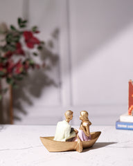 Romantic Couple in Wooden Boat