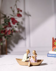 Romantic Couple in Wooden Boat