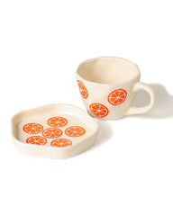 Orange squuze Cuo & Saucer set