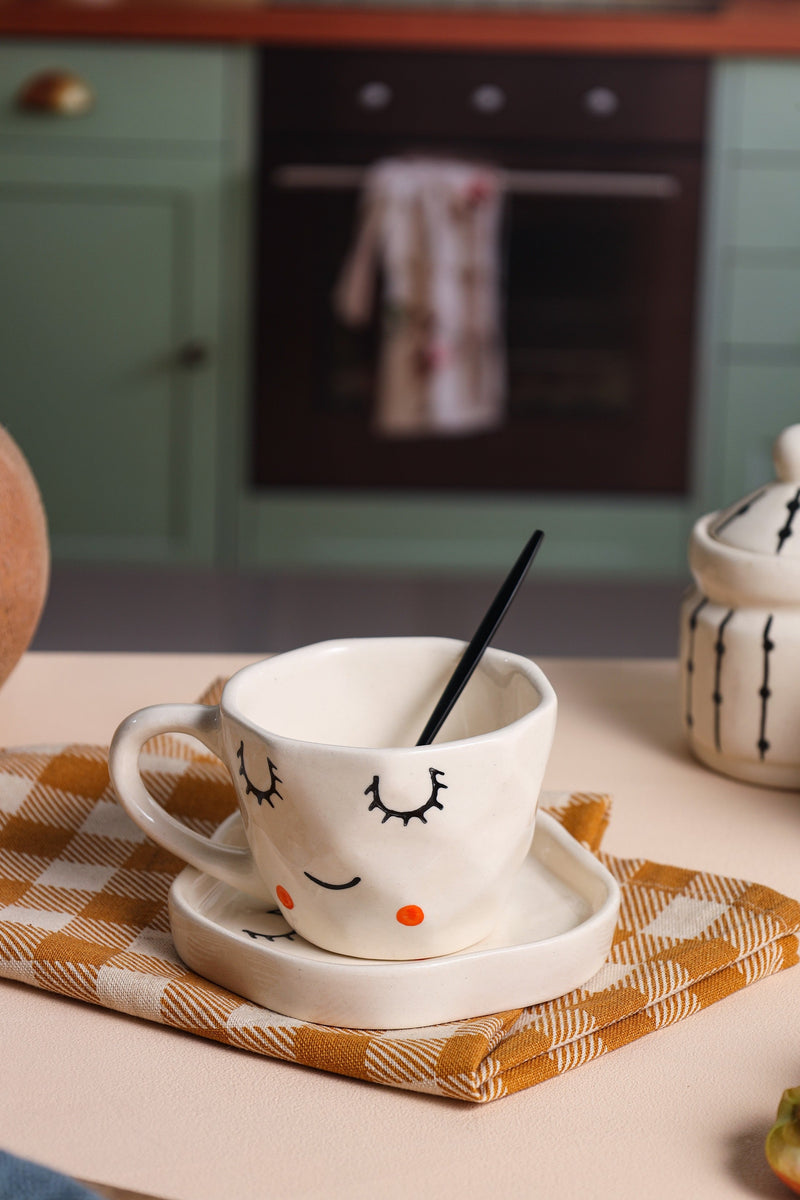 Alamkari India Ceramic Pretty Face shaped Cup & Saucer
